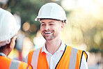 Safety, architecture and happy engineer at a construction site talking or speaking at a home renovation. Smile, contractor and engineering partner in conversation at an outdoor building project job