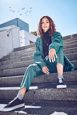 Buy stock photo Fashion, style and city with a model black woman sitting on stairs outside during a summer day. Clothes, urban and lifestyle with a trendy, edgy or stylish young female posing outdoor in a town