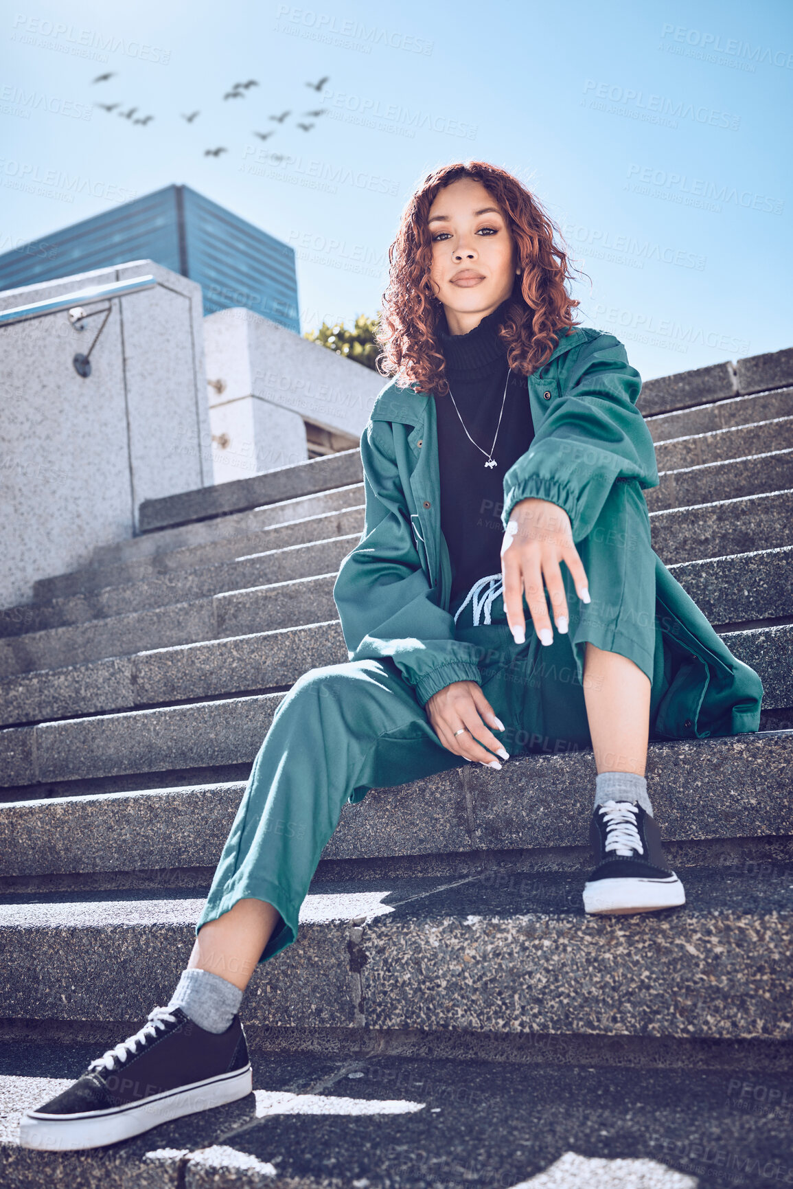 Buy stock photo Fashion, style and city with a model black woman sitting on stairs outside during a summer day. Clothes, urban and lifestyle with a trendy, edgy or stylish young female posing outdoor in a town