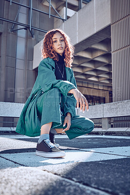 Buy stock photo Trendy, style and cool teenage girl portrait in an urban city  alone. Fashion, street style and young woman on an edgy day outside. Town, clothing and fashionable lady in summer