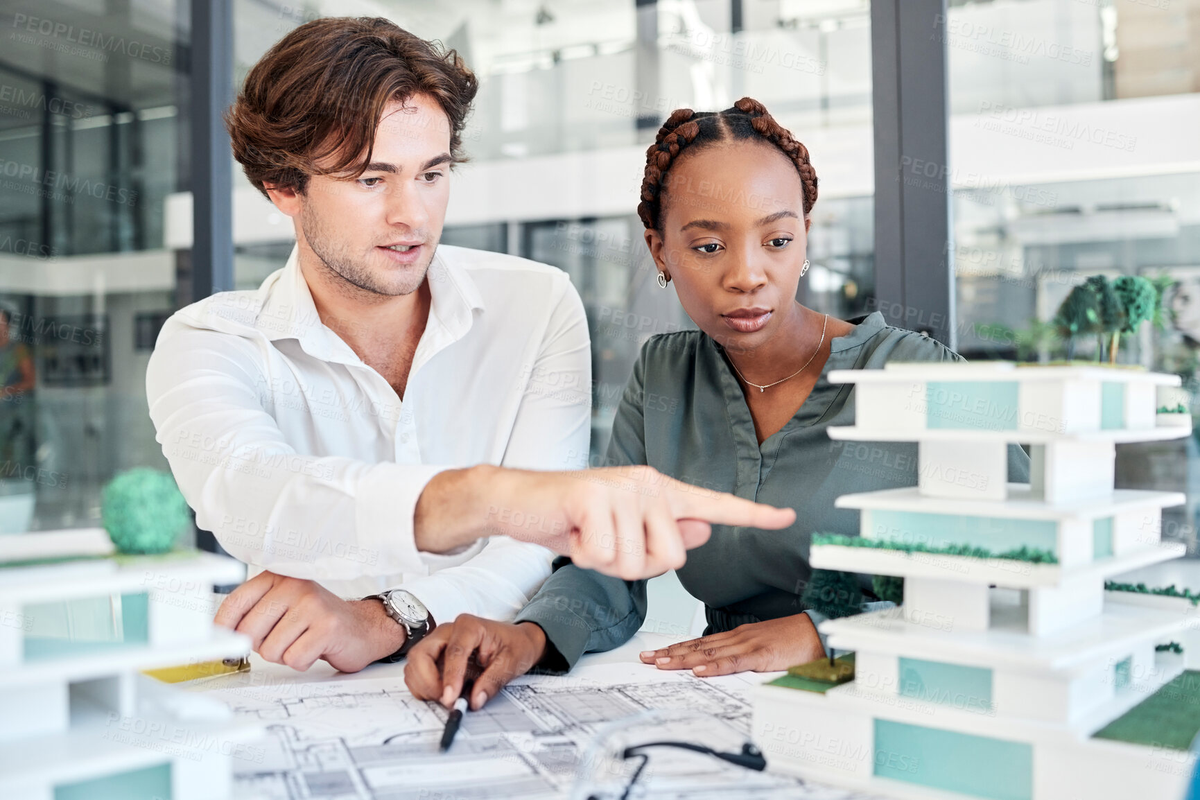 Buy stock photo Architecture, man and woman with building model, discussion or talk for planning construction or collaboration project. Engineer, architect or teamwork for blueprint design, brainstorming or creative