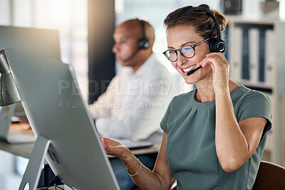 Buy stock photo Customer service, call center and crm with a woman consultant working in a telemarketing office. Support, computer and sales with a female consulting using a headset for help, assist or communication