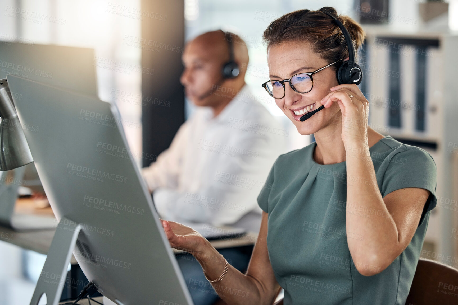 Buy stock photo Customer service, call center and crm with a woman consultant working in a telemarketing office. Support, computer and sales with a female consulting using a headset for help, assist or communication