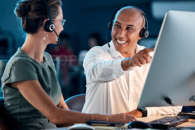 Buy stock photo Call center, customer service and contact us, training and team leader help coworker, crm and communication at computer with headphone. Telemarketing, man and woman working together, support and call