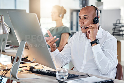 Buy stock photo Helpdesk, customer service and male call center agent giving advice to client online using computer. Crm, customer service and consultant or telemarketing agent offering support on pc in agency 