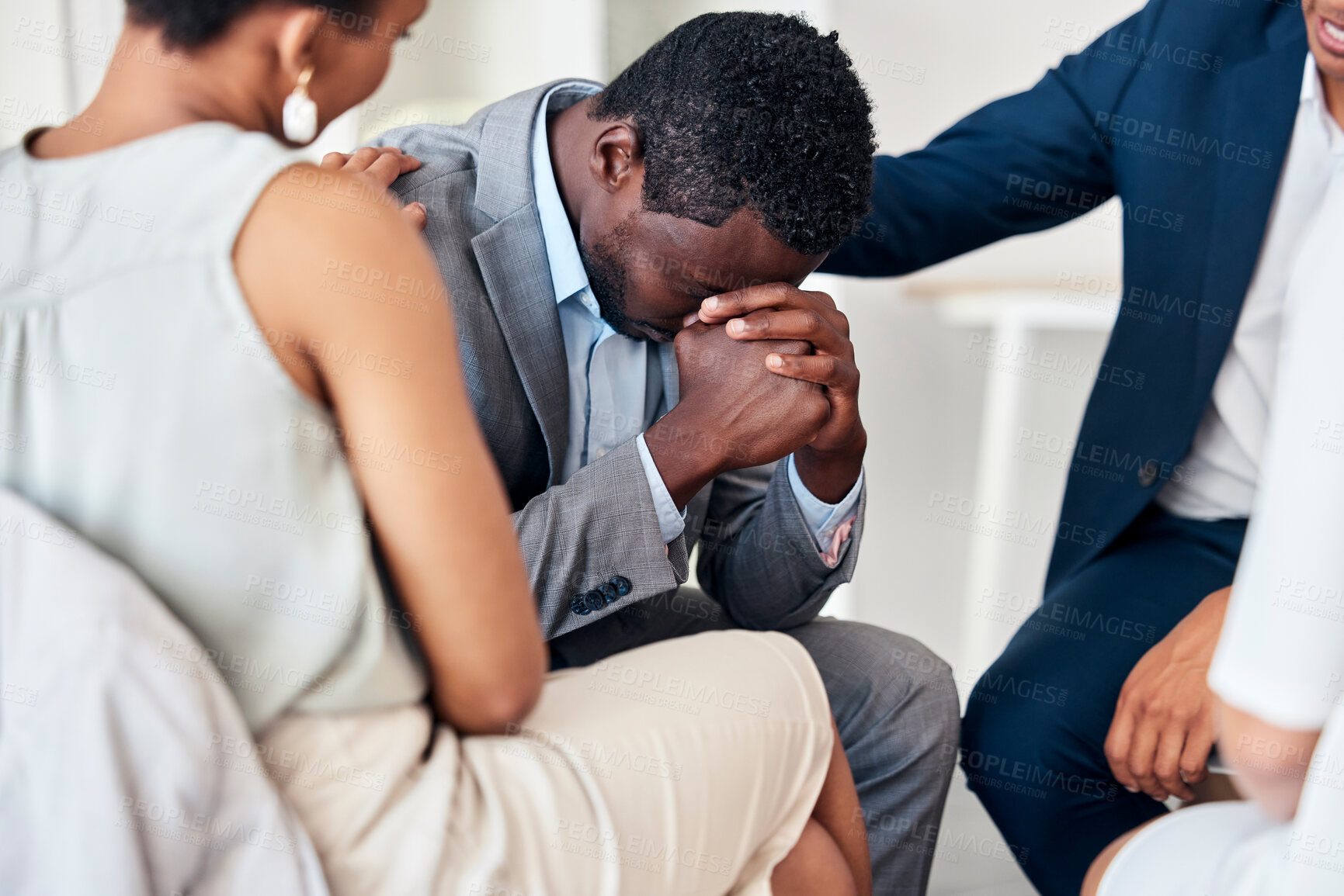 Buy stock photo Black businessman, stress or office support circle in mental health, company burnout or diversity corporate anxiety. Men, women or teamwork collaboration in group therapy, trust or psychology meeting