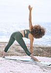 Yoga, exercise and fitness with woman on vacation by beach for calm, relax and spiritual workout while stretching for healthy lifestyle. Female training in nature for health, wellness and balance