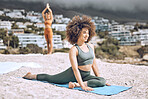 Yoga, fitness and beach with a black woman athlete on a rock by the ocean for a workout or exercise. Nature, summer and health with a happy female yogi training for wellness, zen or mental health