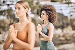 Yoga, zen and meditation with women outdoor for training, workout and exercise on the beach. Fitness, calm and health with a gen z woman and friend exercising during summer for spiritual wellness
