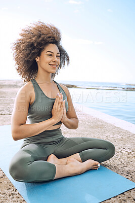 Buy stock photo Yoga, zen and wellness, black woman at the beach for fitness and meditation, mindfulness and peace with exercise outdoor. Workout, stress relief and happy with body training and healthy active life.