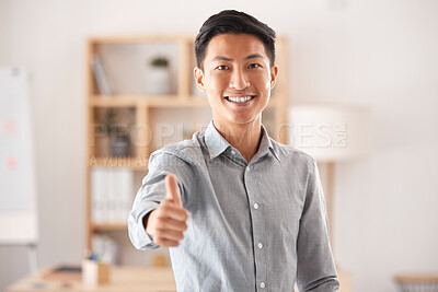 Buy stock photo Thumbs up, success and portrait of Asian businessman standing in office, smile on face and confident. Good work, happy and successful man in marketing, design and creative workspace with hand gesture