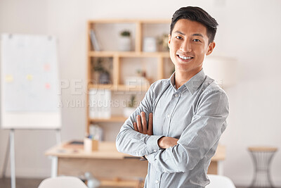 Buy stock photo Leadership, portrait and young Asian businessman standing in creative workspace. Success, startup and man with confidence, happiness and motivation in office working in marketing and design career
