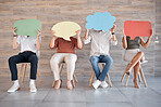 Communication, office and business people holding speech bubble and sitting on chair. Creative, mockup and group of workers with empty sign for diversity in opinion, voice and discussion in workplace