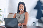 Black woman, business laptop and portrait in busy office typing email, report or research. Happy, smile and female in company workplace on computer working, writing proposal or sales growth strategy.