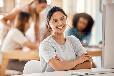 Buy stock photo Computer, learning and education with a woman student sitting at a desk in the classroom for study or development. Portrait, university and scholarship with a young female college pupil in class