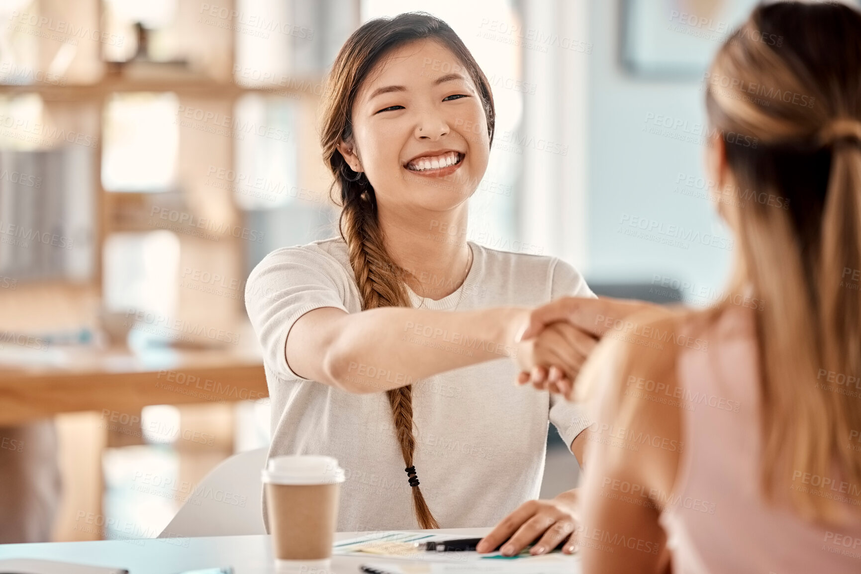 Buy stock photo Business women, interview and handshake by happy, smile and hand of hr in support of deal, contract and hiring in office. Hand shake, partnership and recruitment success by excited asian leader 
