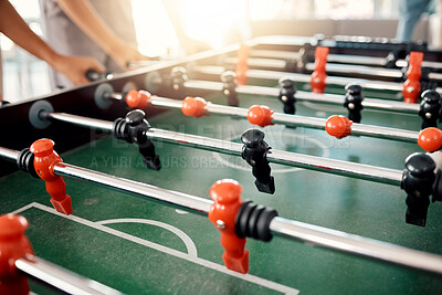 Buy stock photo People hands, foosball table and competition in arcade with retro games, soccer action board and plastic toys for team play. Closeup of tabletop soccer challenge, football fun and party entertainment