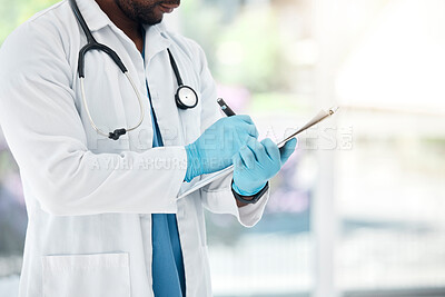 Healthcare, paper and doctor writing in a hospital, insurance and compliance form before surgery. Hands, medical and record by health worker write clipboard note, prescription and medicine planning