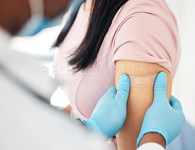 Buy stock photo Covid, vaccine and bandaid with hands of doctor and woman arm for medicine, medical and consulting. Wellness, first aid and healthcare with nurse and patient for virus, flu and treatment injection