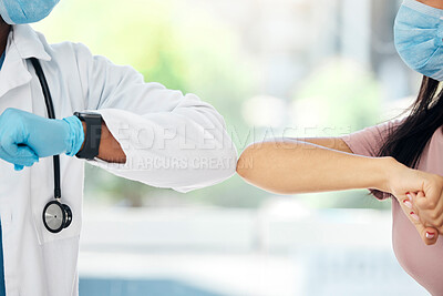 Buy stock photo Covid, doctor and woman elbow bump hello for covid compliance, safety and social distancing in hospital. Safety, nurse and patient arm greeting during corona pandemic in consultation room for health