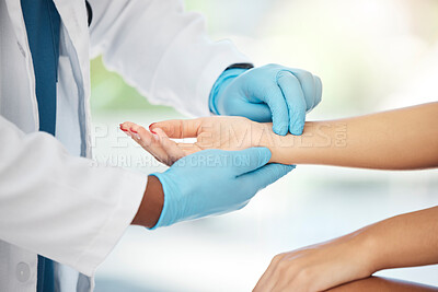 Buy stock photo Doctor, hands or woman checking pulse on wrist in hospital, wellness center or healthcare clinic checkup. Zoom, medical worker or consulting medicine employee in heart rate help for patient insurance