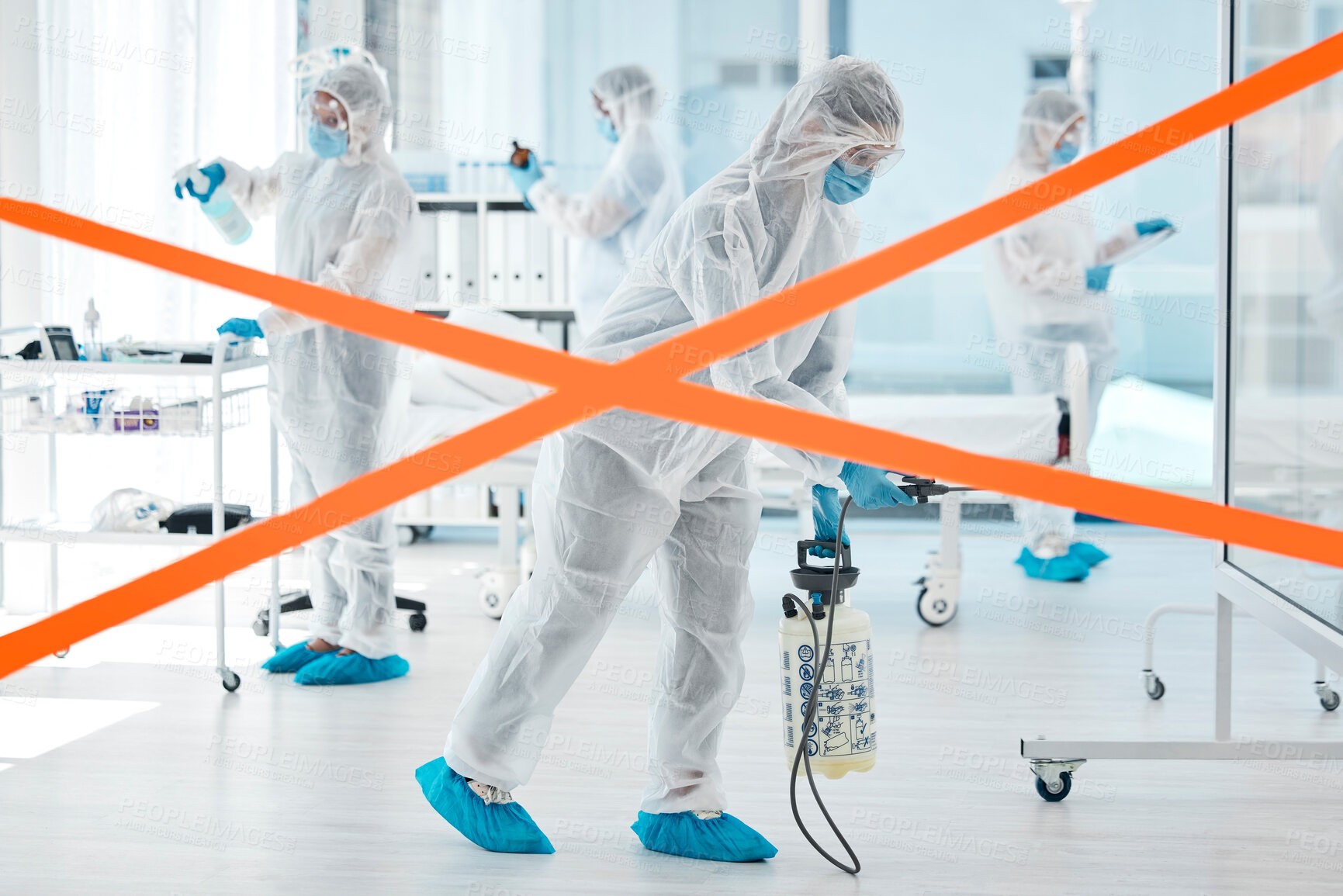 Buy stock photo Covid, red tape and hospital people with healthcare crisis management cleaning workplace in face mask, safety gear and disinfectant. Clinic medical doctors, scientist team or group in ppe hazmat suit
