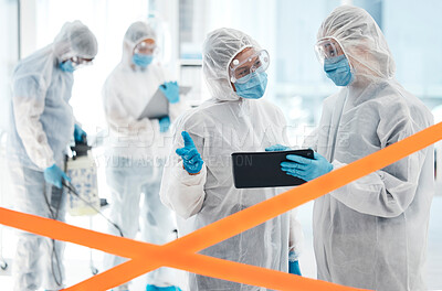Buy stock photo Tablet, covid and team in hazmat suit, cleaning and communicate with face mask for safety from virus. Warning tape, covid 19 and team disinfect hospital for healthcare and bacteria hygiene biohazard