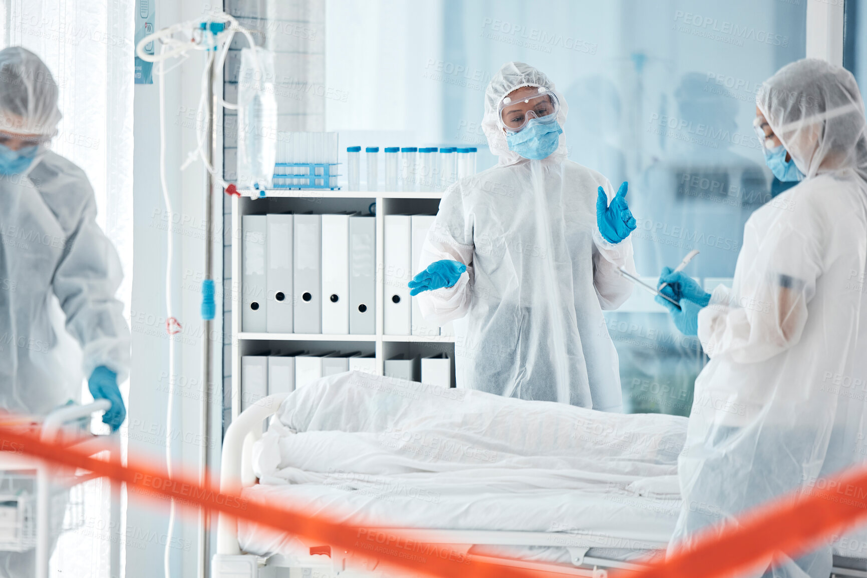 Buy stock photo Healthcare, covid and doctors with ppe for safety, health and  compliance in a hospital with dead patient while staff takes notes of time. Medical workers in covid 19 unit for emergency virus