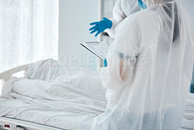 Death, covid and doctors writing paper for patient in a bed at a hospital due to virus. Healthcare, medical and clinic workers with communication, report and help during health crisis in pandemic