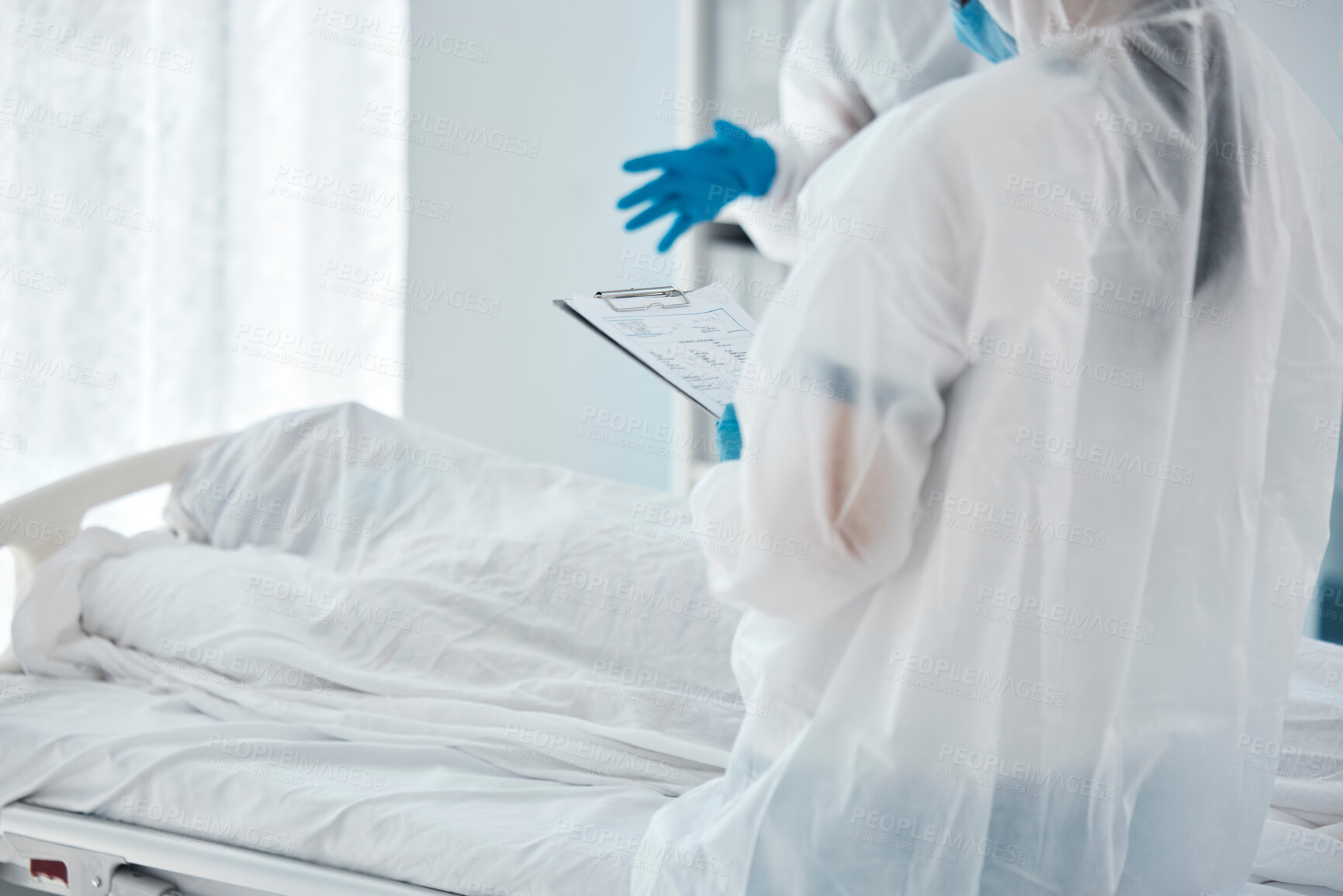 Buy stock photo Death, covid and doctors writing paper for patient in a bed at a hospital due to virus. Healthcare, medical and clinic workers with communication, report and help during health crisis in pandemic