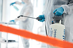 Covid disinfection, red tape and man in hazmat suit to safety protect from corona virus while cleaning hospital clinic. Contaminated science laboratory, medical ppe or healthcare worker sanitize room