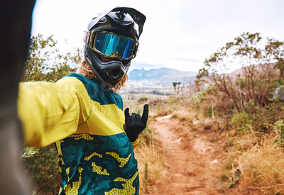 Buy stock photo Sports, biker selfie and cycling in nature, countryside or outdoors. Bmx, rock hand sign or self portrait of cyclist on sand or dirt road for adventure, memory or online picture post on social media 