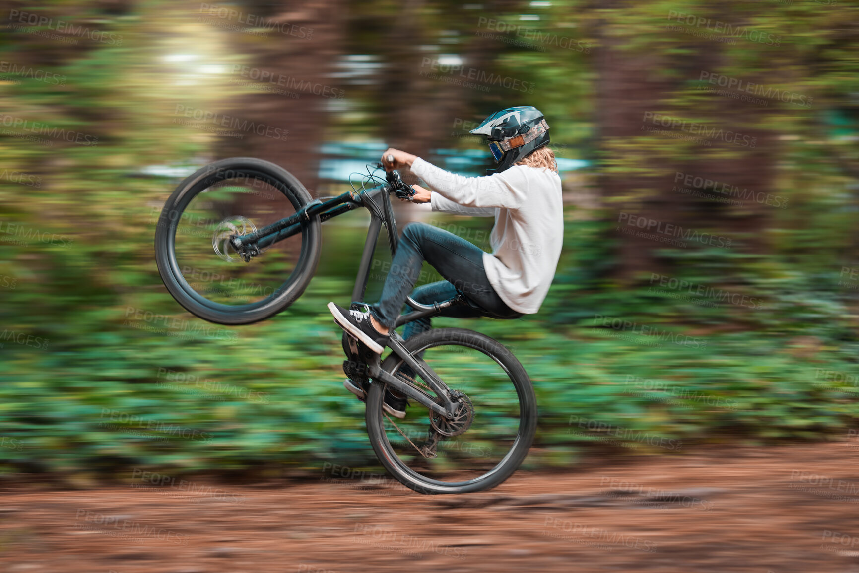 Buy stock photo Bike, cycling and nature motor cross drive of a adventure, fast energy and sport man on a dirt road. Bicycle ride of a sports person on a forest trail in the woods with a cyclist and  race rider 