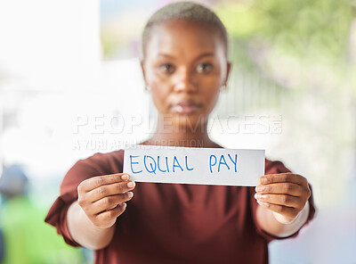 Buy stock photo Equal pay, paper sign and black woman protest for women work salary rights outdoor. Portrait of a young person from Africa with serious protesting for female worker empowerment and equality 