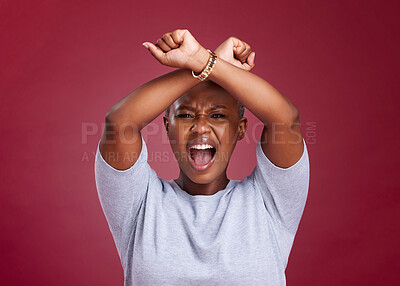 Buy stock photo Black woman, shouting and protest to stop racism or discrimination against a red studio background. Angry African American female voice with arms crossed on strike or fight for human rights on mockup