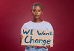 Black woman, protest and billboard message for change, text or voice against mockup studio background. Portrait of African American female activist with banner, poster or sign for empowerment or vote