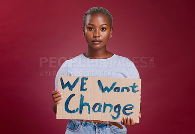 Buy stock photo Black woman, protest and billboard message for change, text or voice against mockup studio background. Portrait of African American female activist with banner, poster or sign for empowerment or vote