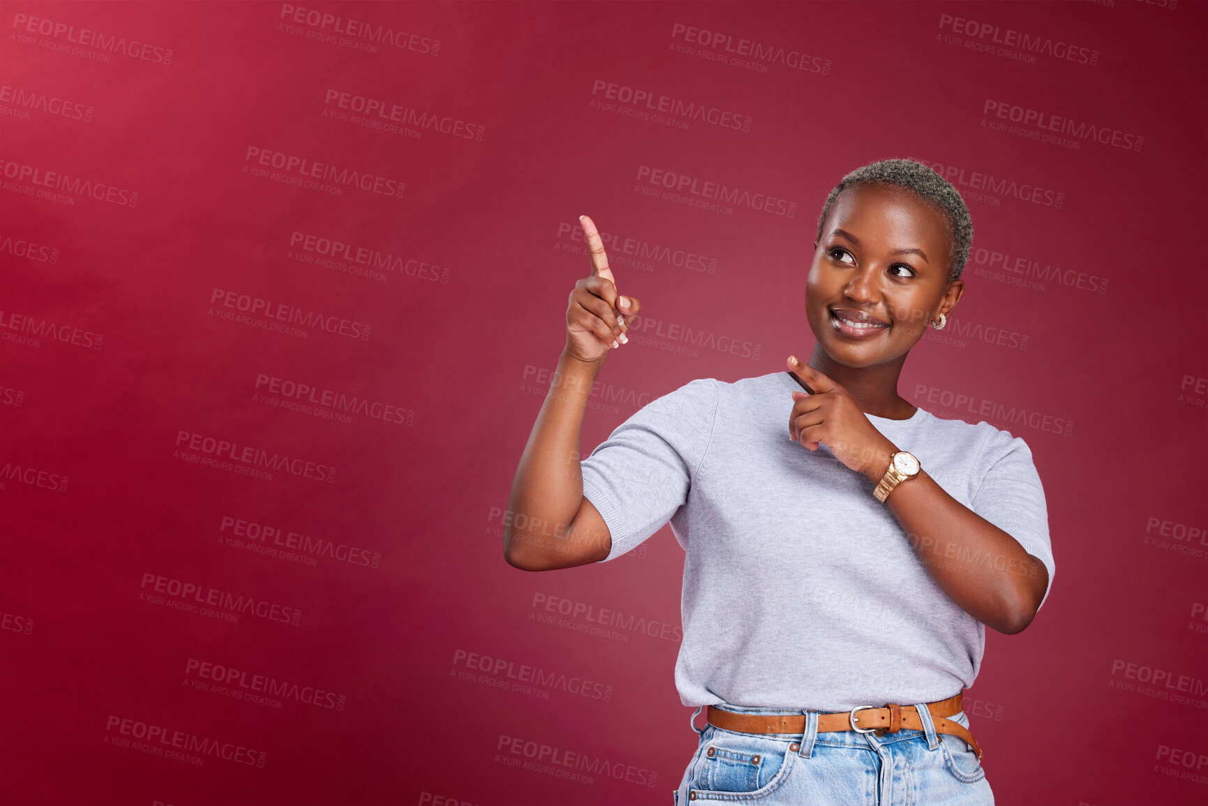 Buy stock photo Black woman, mockup and pointing in advertising, sale or marketing with smile against a studio background. African American female in advertisement with empty copy space for message, text or brand