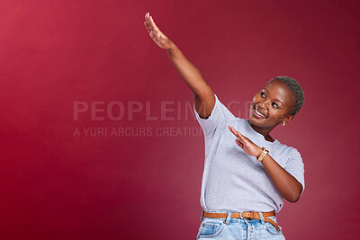 Buy stock photo Dance, marketing and happy black woman in studio with a red background in celebration of a sale or discount. Success, winner and excited African girl dancing with pride with advertising mockup space