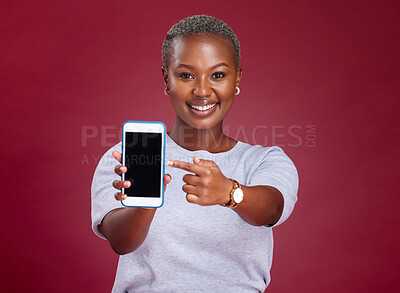 Buy stock photo Black, woman and blank phone screen on a red studio background for marketing and advertising. African american female, mobile with mockup screen for internet search and social media browsing