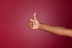 Thumbs up, yes and agreement hand sign of a black woman showing support, motivation and success. Thank you, goal and happy winner hands gesture to show good news, done goal and achievement victory