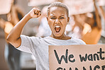 Power, motivation and scream protest of a black woman protesting for social change. Portrait of a young woman activist from New York fighting for women and equal rights and justice for minority