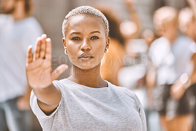 Buy stock photo Stop, protest and hand of black woman in city for activism, social justice or empowerment. Justice, freedom and support with girl no or caution sign for global change, human rights or gender equality