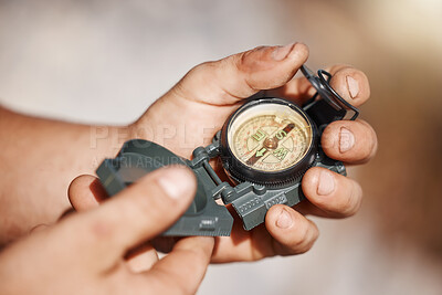 Buy stock photo Hiking man, hands or pocket compass in travel location, camping ground direction or destination arrow map. Zoom, navigation device or magnetic north guide for nature camper in countryside environment