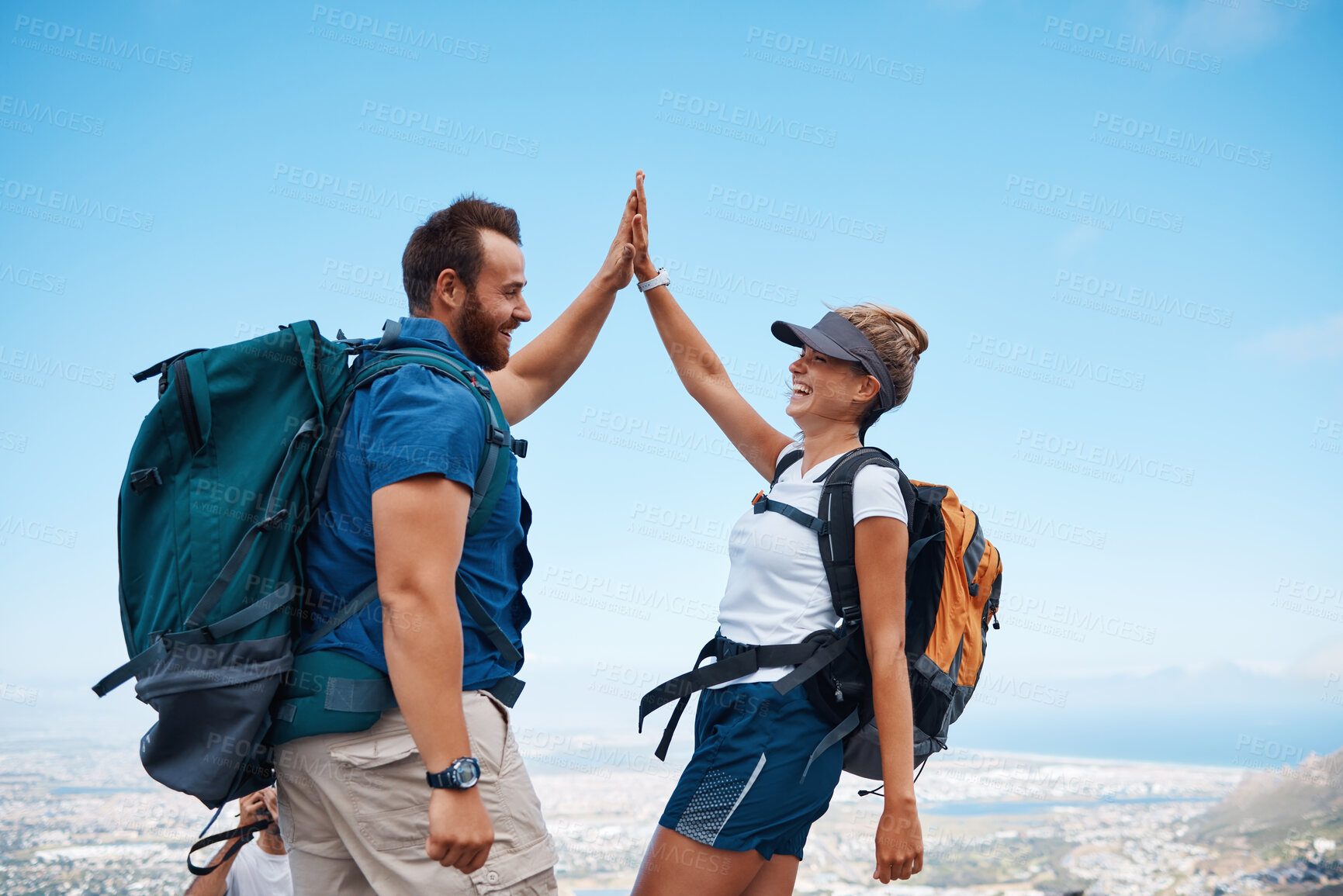 Buy stock photo Hiking, high five and happy couple on an adventure in nature while on summer vacation in South Africa. Happiness, freedom and friends trekking on an outdoor trail for exercise on holiday or journey.