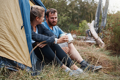Buy stock photo Friends, camping tent and drink coffee together morning routine before hike. Relax family conversation, calm man and woman with warm tea or couple on nature travel vacation relaxing outdoor lifestyle