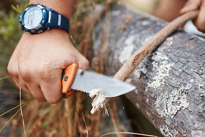 Buy stock photo Camping man, knife and cut wood, tree branch and sharp stick for campfire, hunting and outdoor hiking. Hiker hands, sharp tool and carving plants in nature, forest or survival woods, weapon and spear