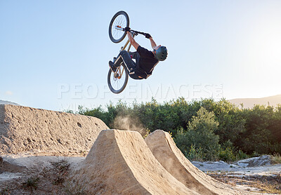 Buy stock photo Mountain bike, nature and cyclist man outdoor for sports, travel and adventure with energy, fitness and freedom while cycling, jump and training. Male athlete in air with bicycle for exercise workout