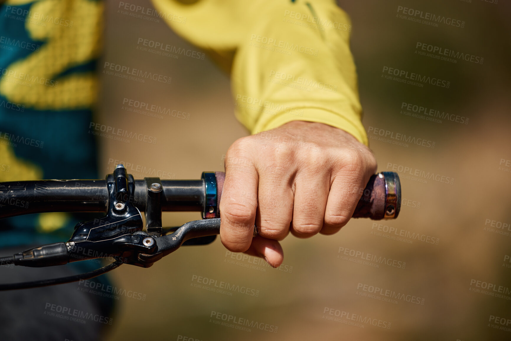Buy stock photo Hand, handle and bike with a man athlete or cyclist riding outdoor for fitness, exercise or cardio. Workout, health grip with a male bicycle rider holding on a handlebar while outdoor for endurance