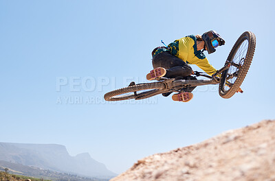 Nature, cycling and man jump with bike in air stunt, performance and outdoor sport exercise in Canada. Mountain bike, adventure and fitness of person with flying action on bicycle with sky mockup.